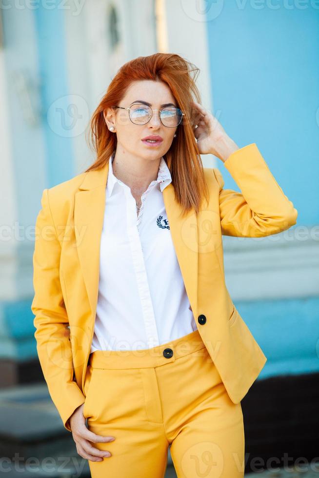 Confident business expert. Happy successful professional posing near office building. European girl. Russian business lady. Female business leader concept. Portrait Of Successful Business Woman photo