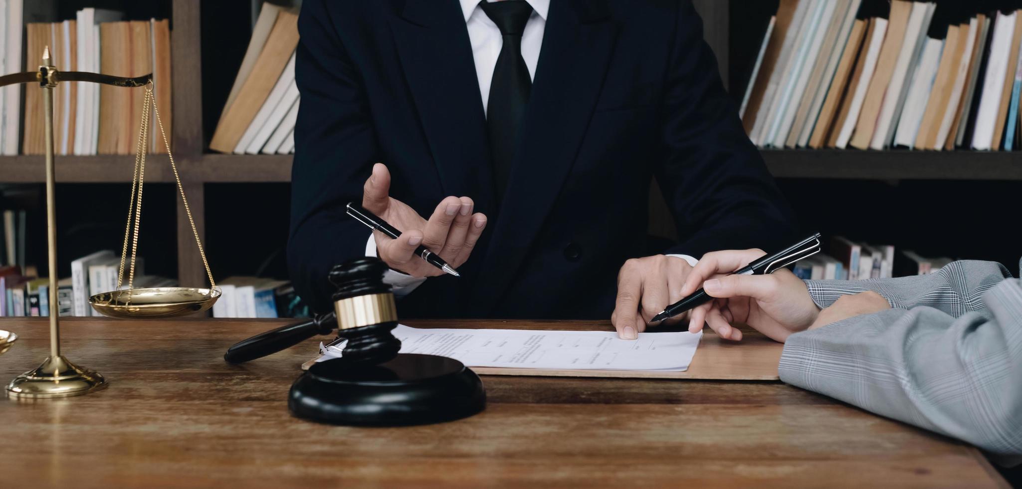 Group of business people and lawyers discussing contract papers ,Consultation between a male lawyer and businessman concept photo