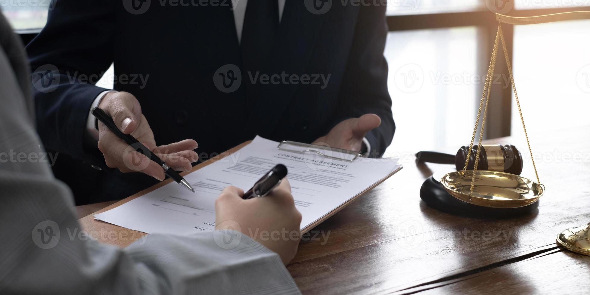 Group of business people and lawyers discussing contract papers ,Consultation between a male lawyer and businessman concept photo