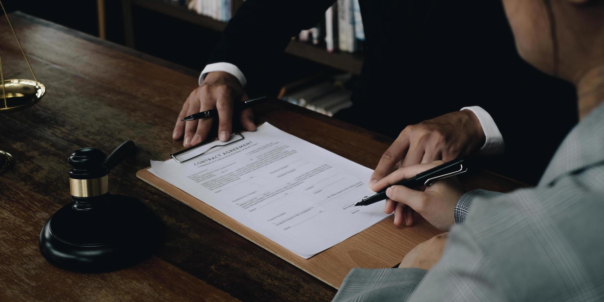 Group of business people and lawyers discussing contract papers ,Consultation between a male lawyer and businessman concept photo