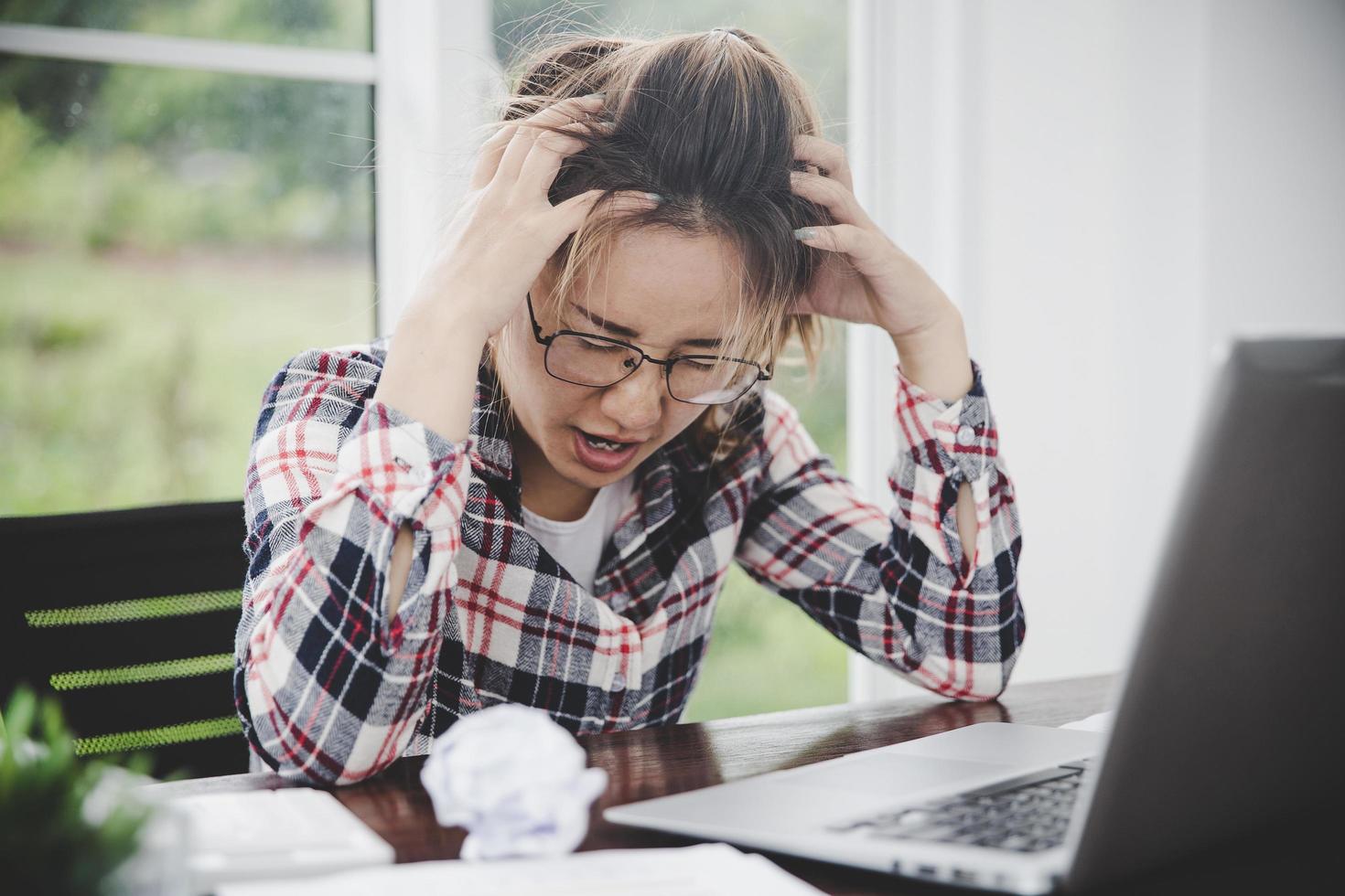 woman stress from work overload photo