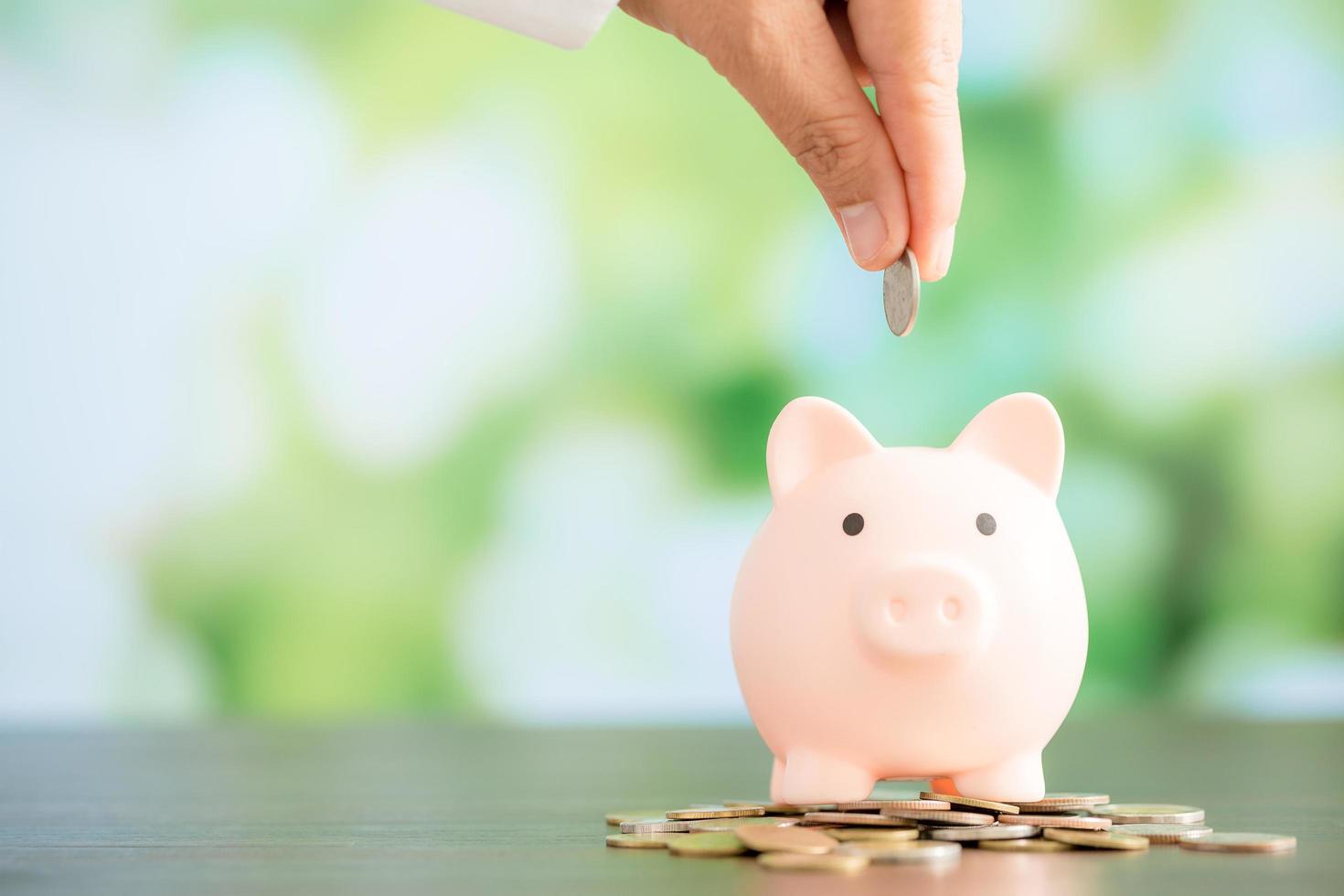 pink piggy bank with bokeh background photo