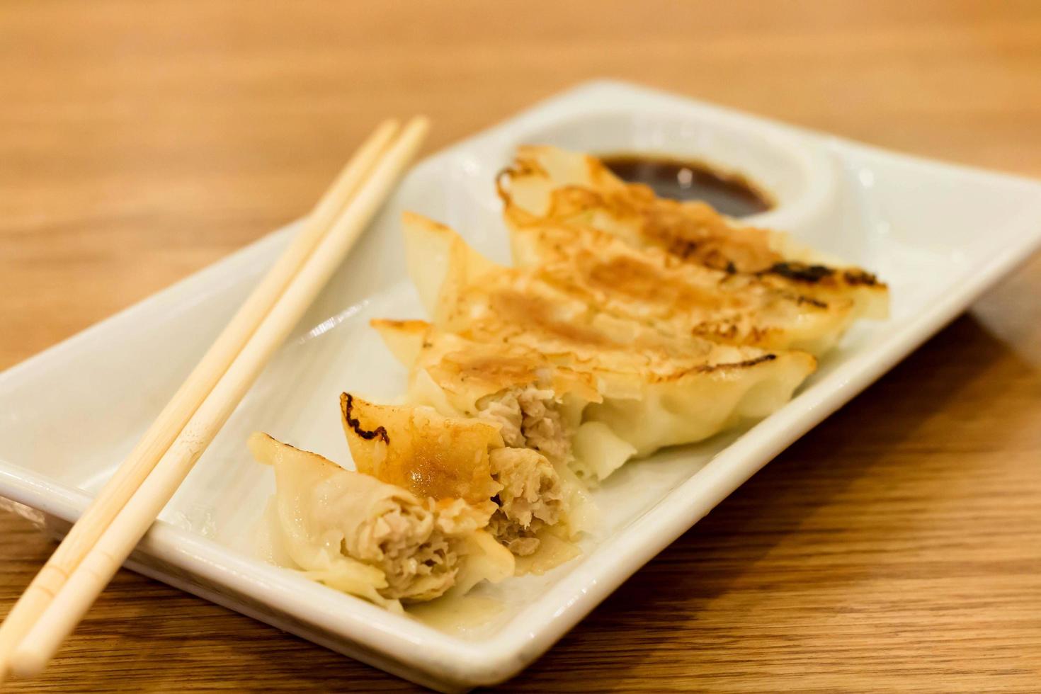fried dumplings on table photo