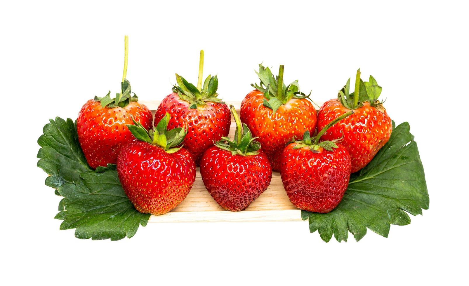 red strawberries in row photo