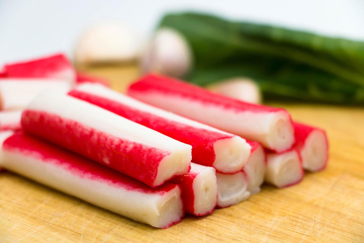 crab sticks on wooden board photo