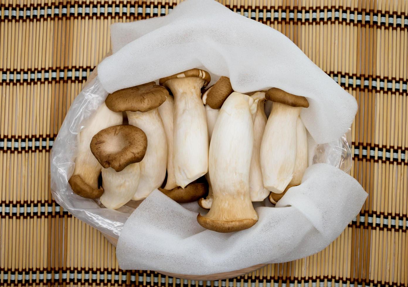 unpacked mushrooms on board photo