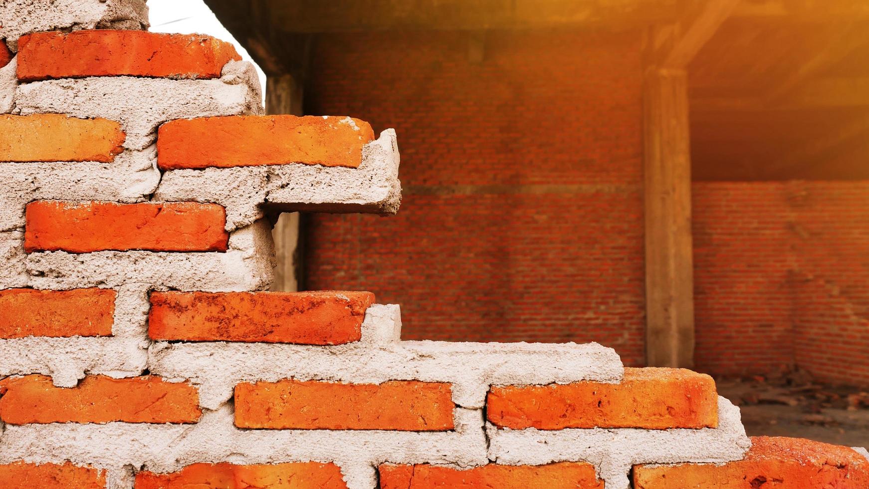 Close-up of the rubble of an industrial building collapsing into a pile of concrete and brick. and the jagged debris caused by the failure of the engineers at the abandoned construction. photo