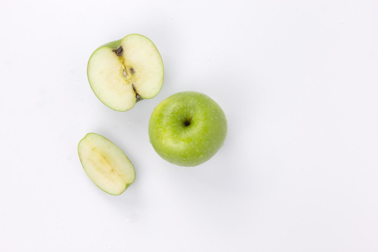 Green apple isolated on a white background photo