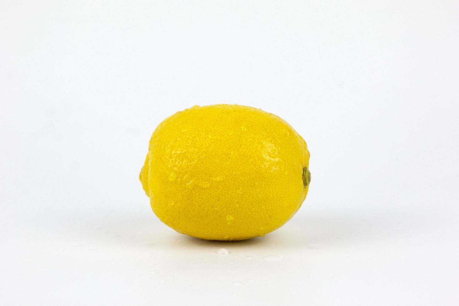 A Yellow lemon isolated on white background, A fresh Lemon citrus fruit with clipping path. Full depth of field photo