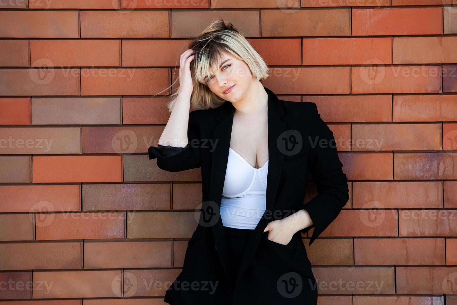 Confident business expert. Happy successful professional posing near office building. European girl. Russian business lady. Female business leader concept. Portrait Of Successful Business Woman photo