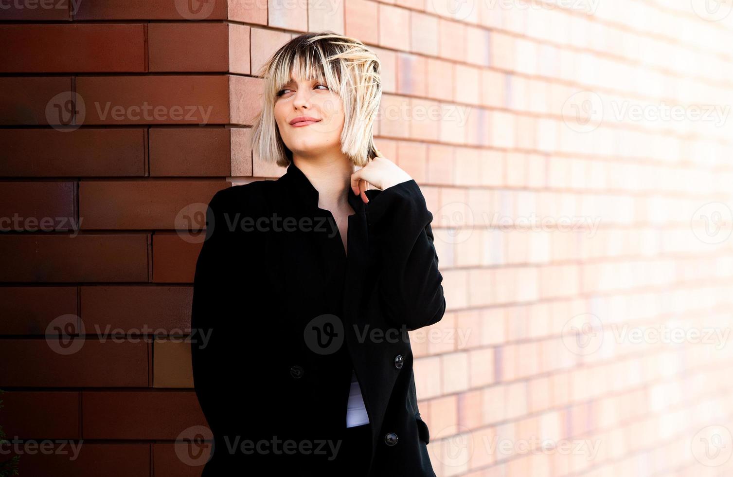 Confident business expert. Happy successful professional posing near office building. European girl. Russian business lady. Female business leader concept. Portrait Of Successful Business Woman photo