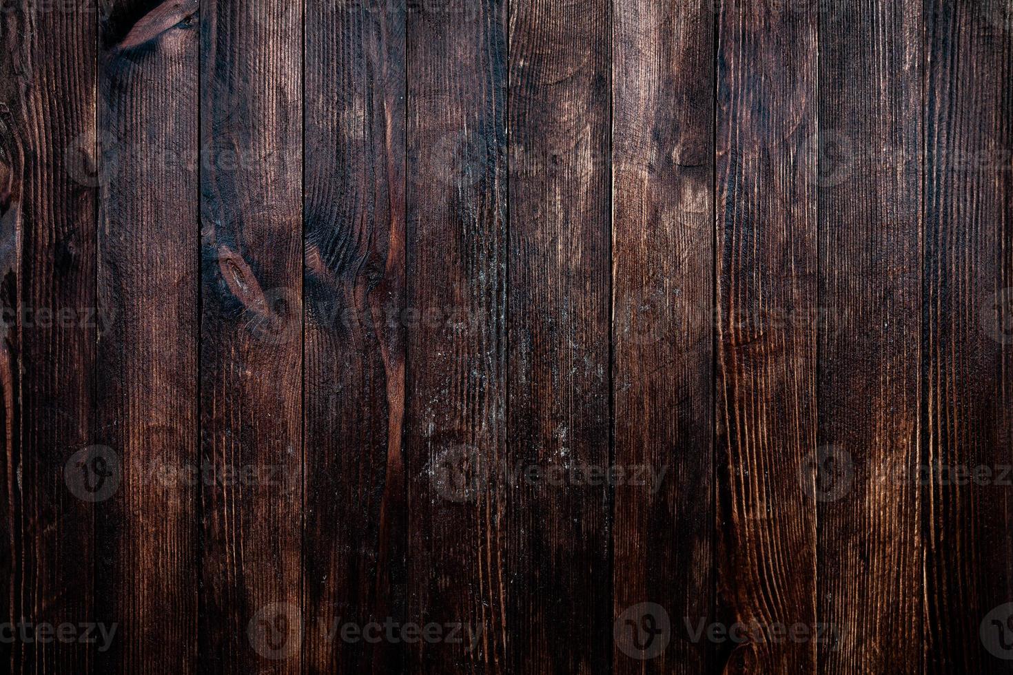 Vintage brown wood background texture with knots and nail holes. Old painted wood wall. Brown abstract background. Vintage wooden dark horizontal boards. Front view with copy space photo