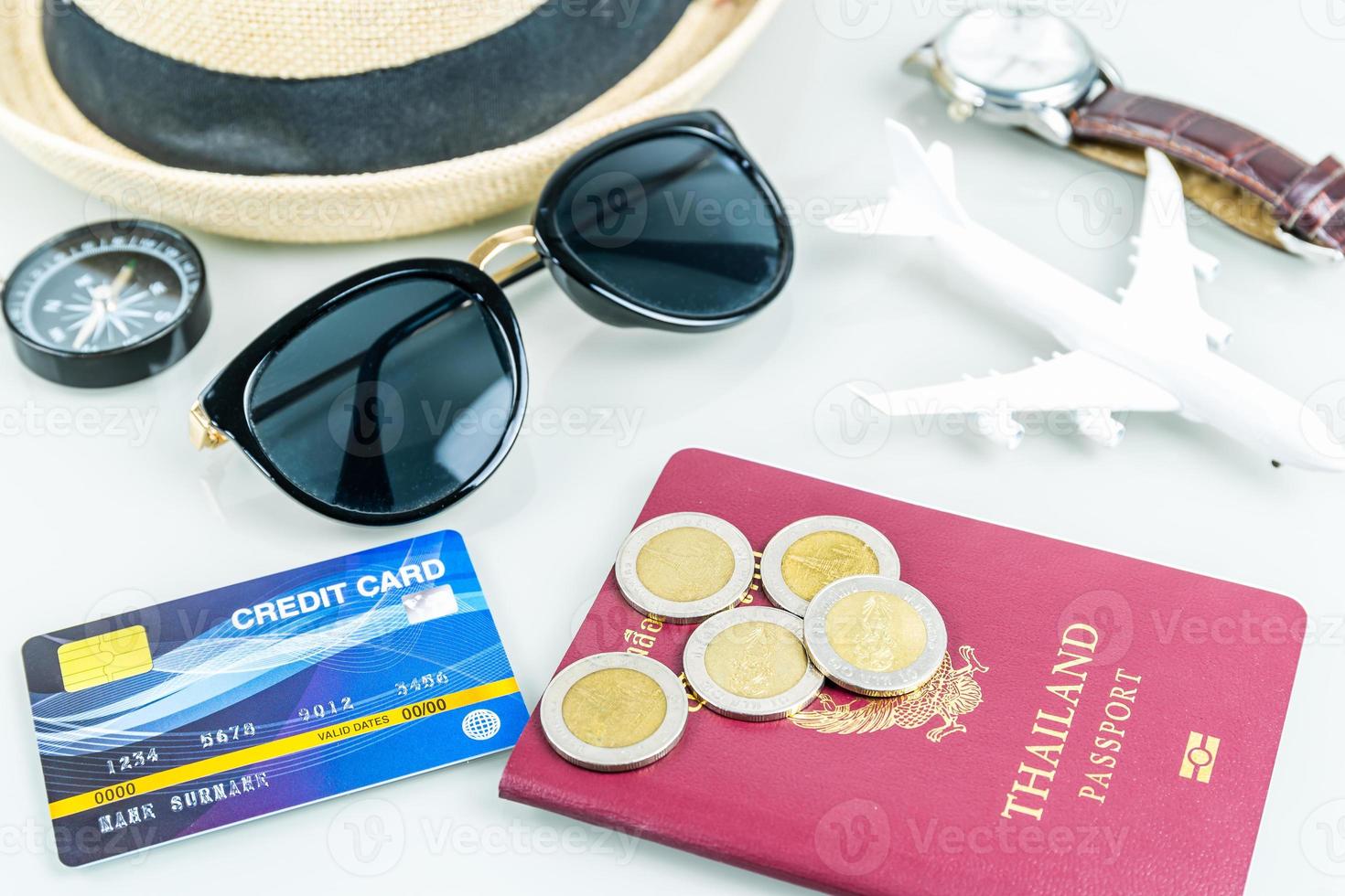 Traveling concept, passport, credit card on white photo