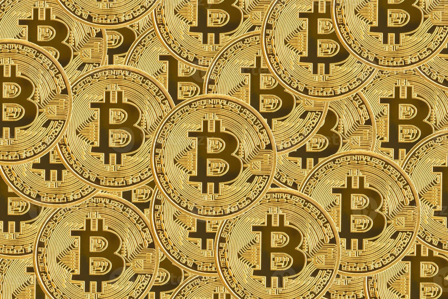 símbolo de bitcoin dorado con fondo de moneda foto