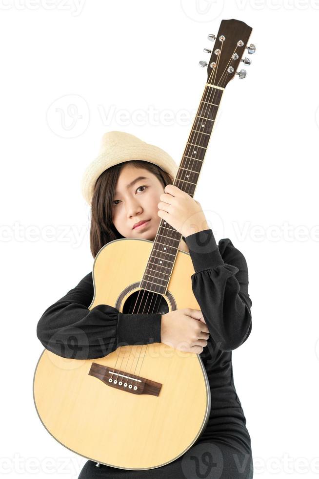 Woman hold guitar guitar folk song in her hand photo