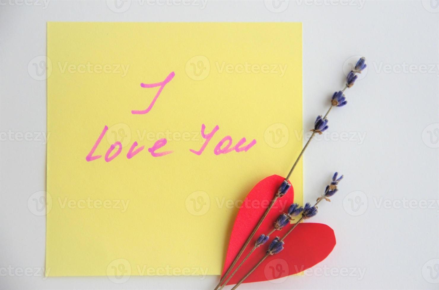 note with the inscription I love you with heart and lavender photo