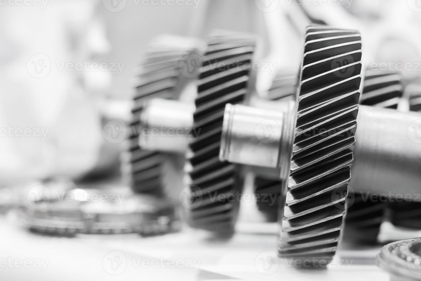 Close up cog wheels gears photo