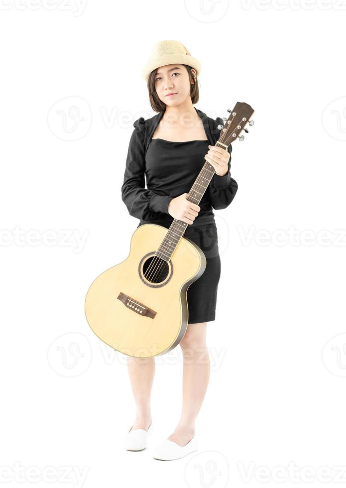 Woman hold guitar guitar folk song in her hand photo