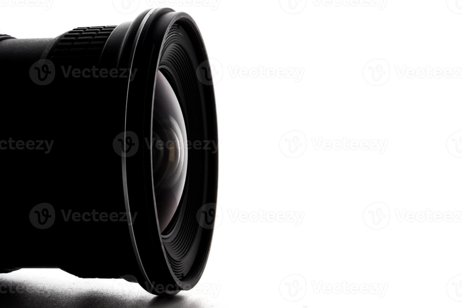 Close up of camera lens with a white background. photo