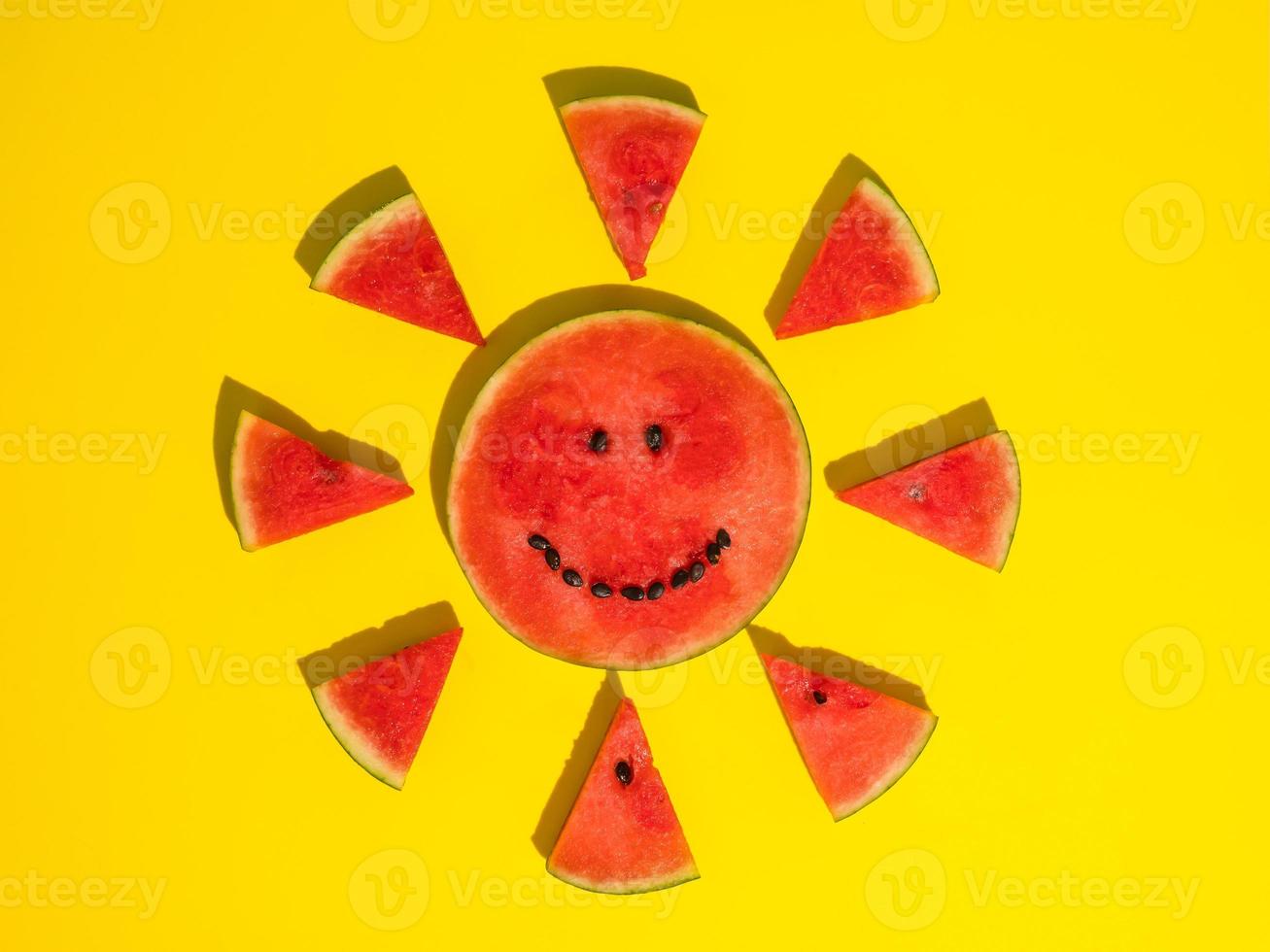 Fresh ripe watermelon slices on yellow background. photo