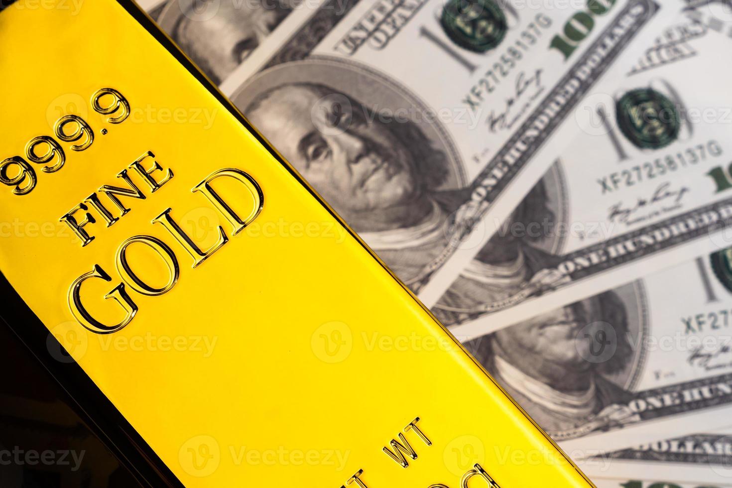 Close up of Gold bar and banknotes. financial concept photo