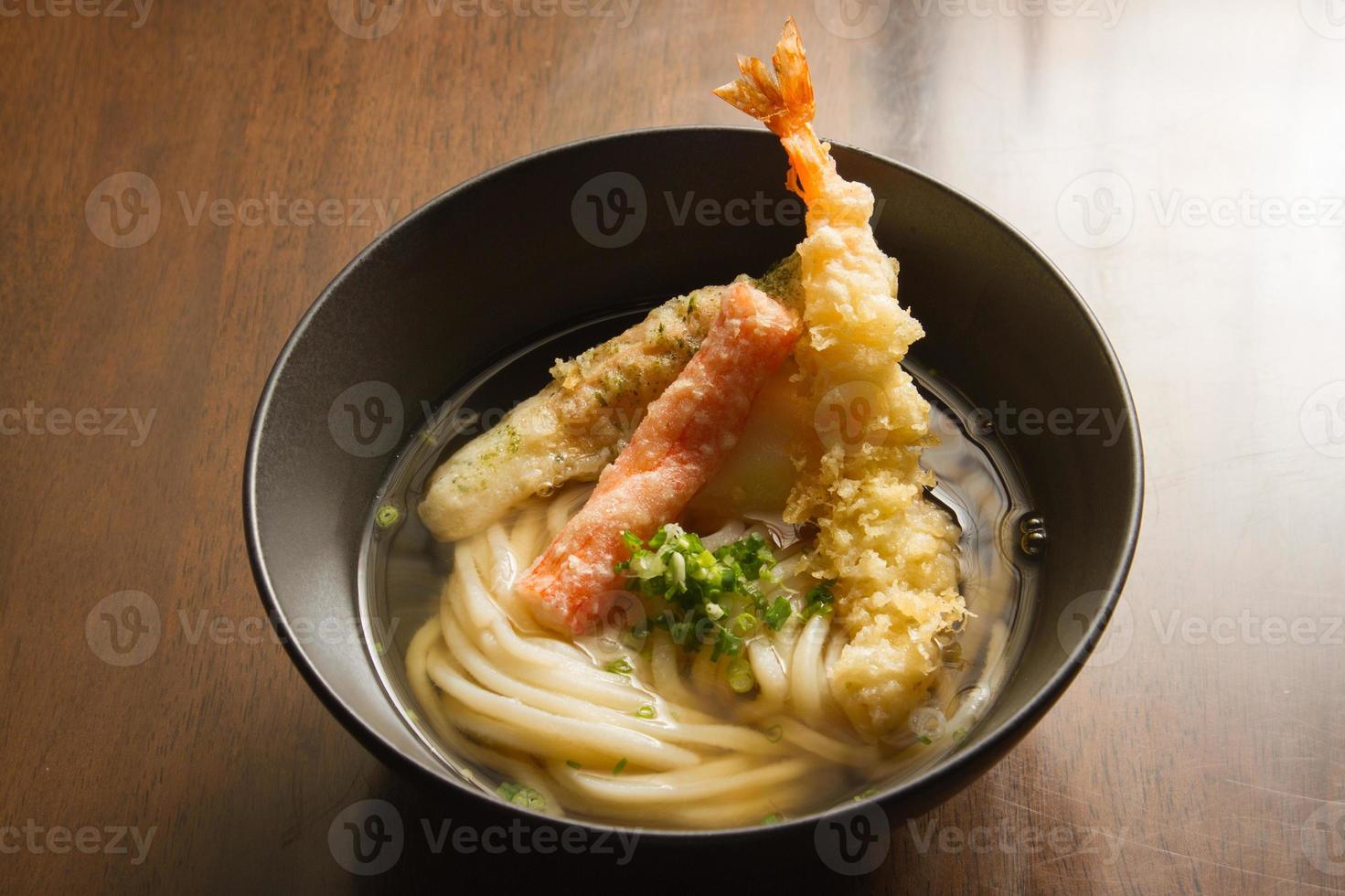 Udon ramen noodles with shrimps tempura. Japanese food photo