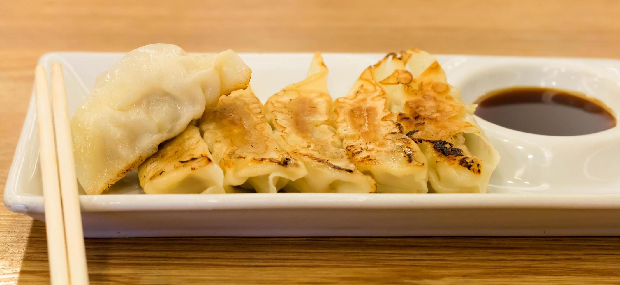 fried dumplings on table photo