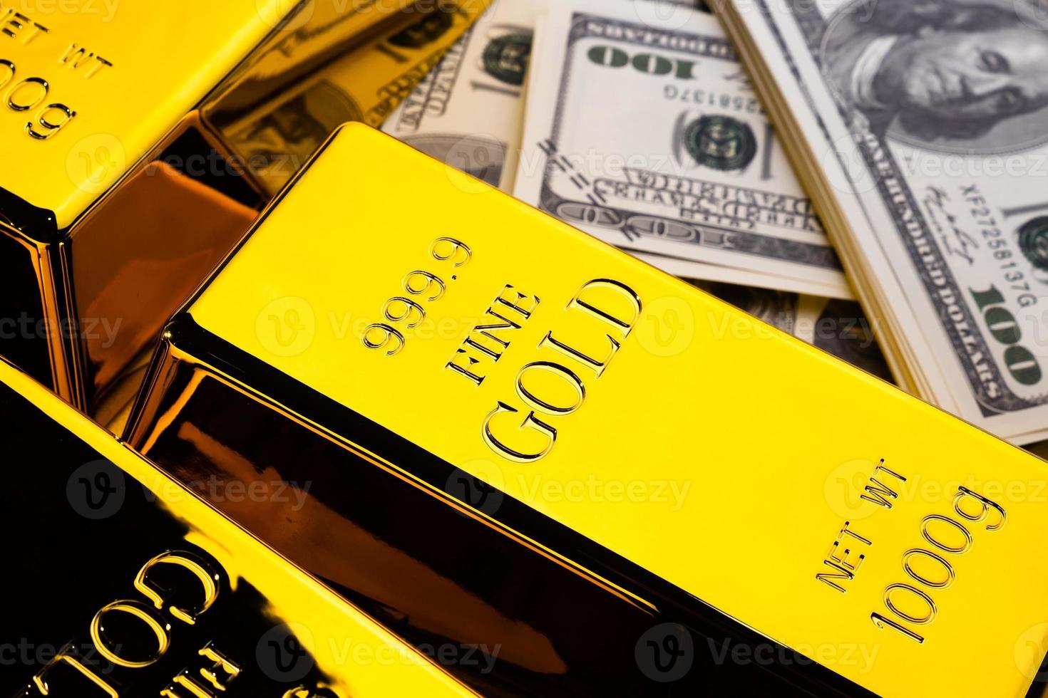 Close up of Gold bars and banknotes. financial concept photo