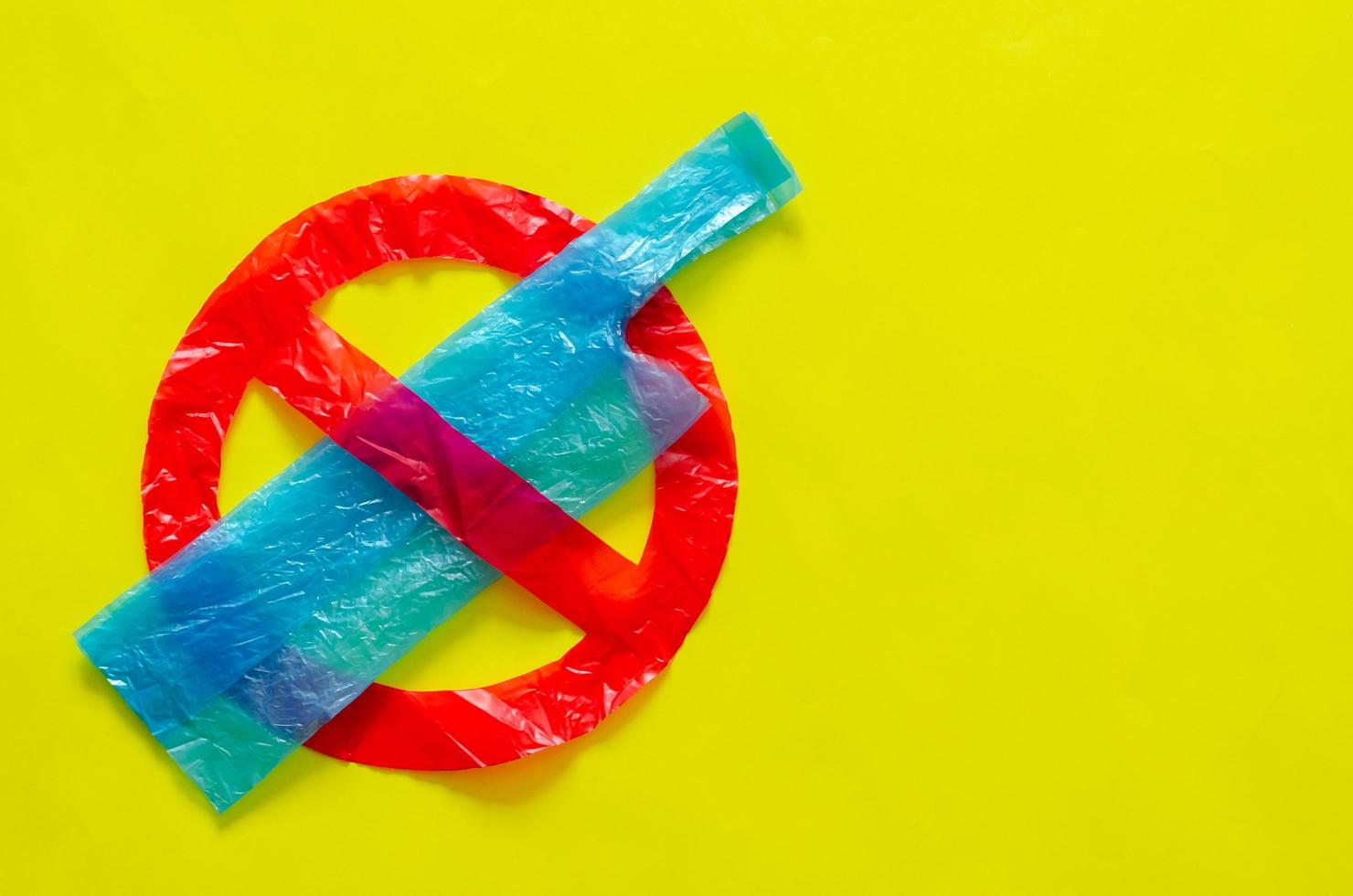 The symbol of stop using unfriendly environmental packages that made from plastic bags. photo