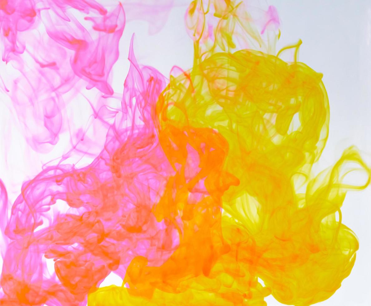 Food color drop and dissolve in water for abstract and background. photo