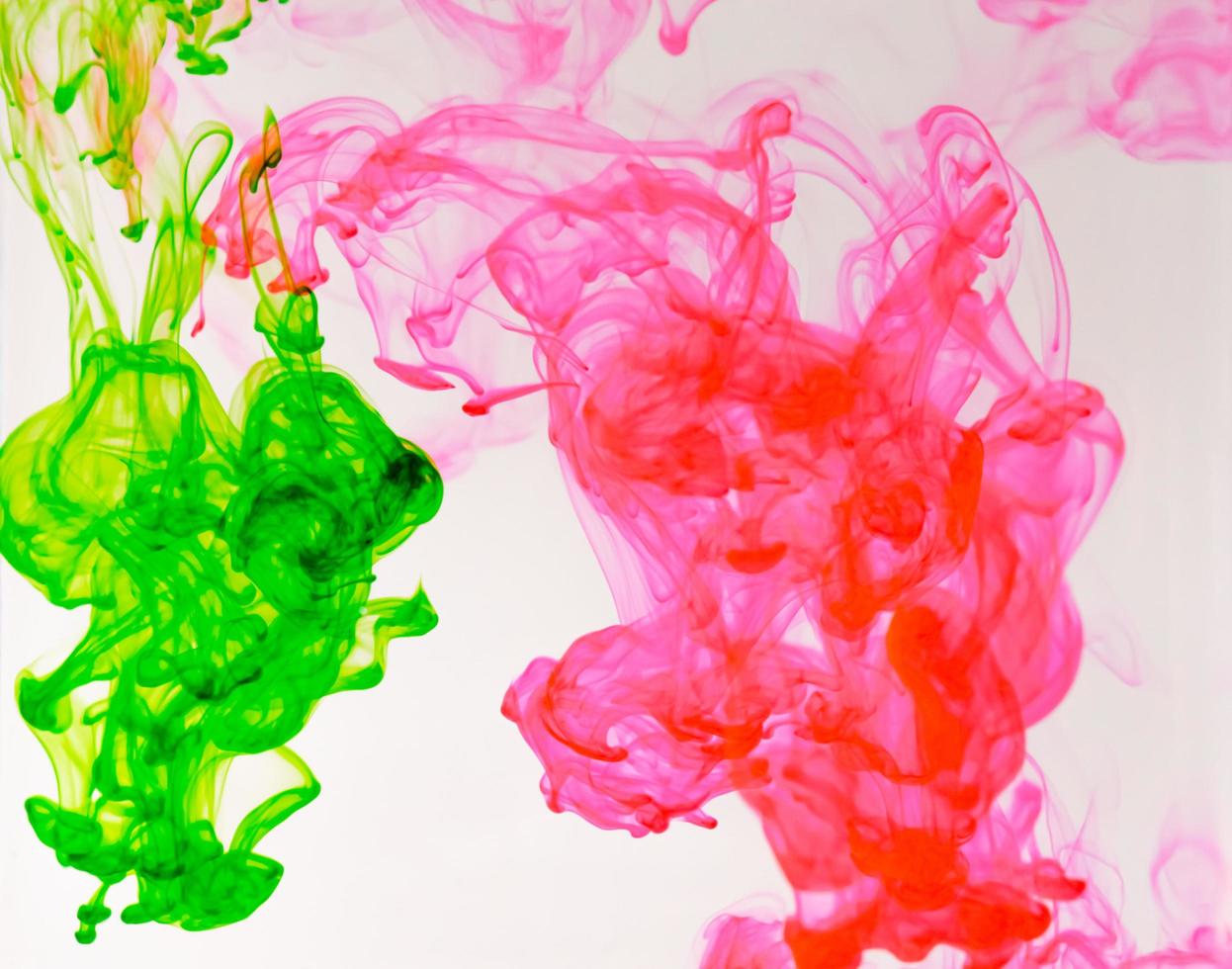 Food color drop and dissolve in water for abstract and background. photo