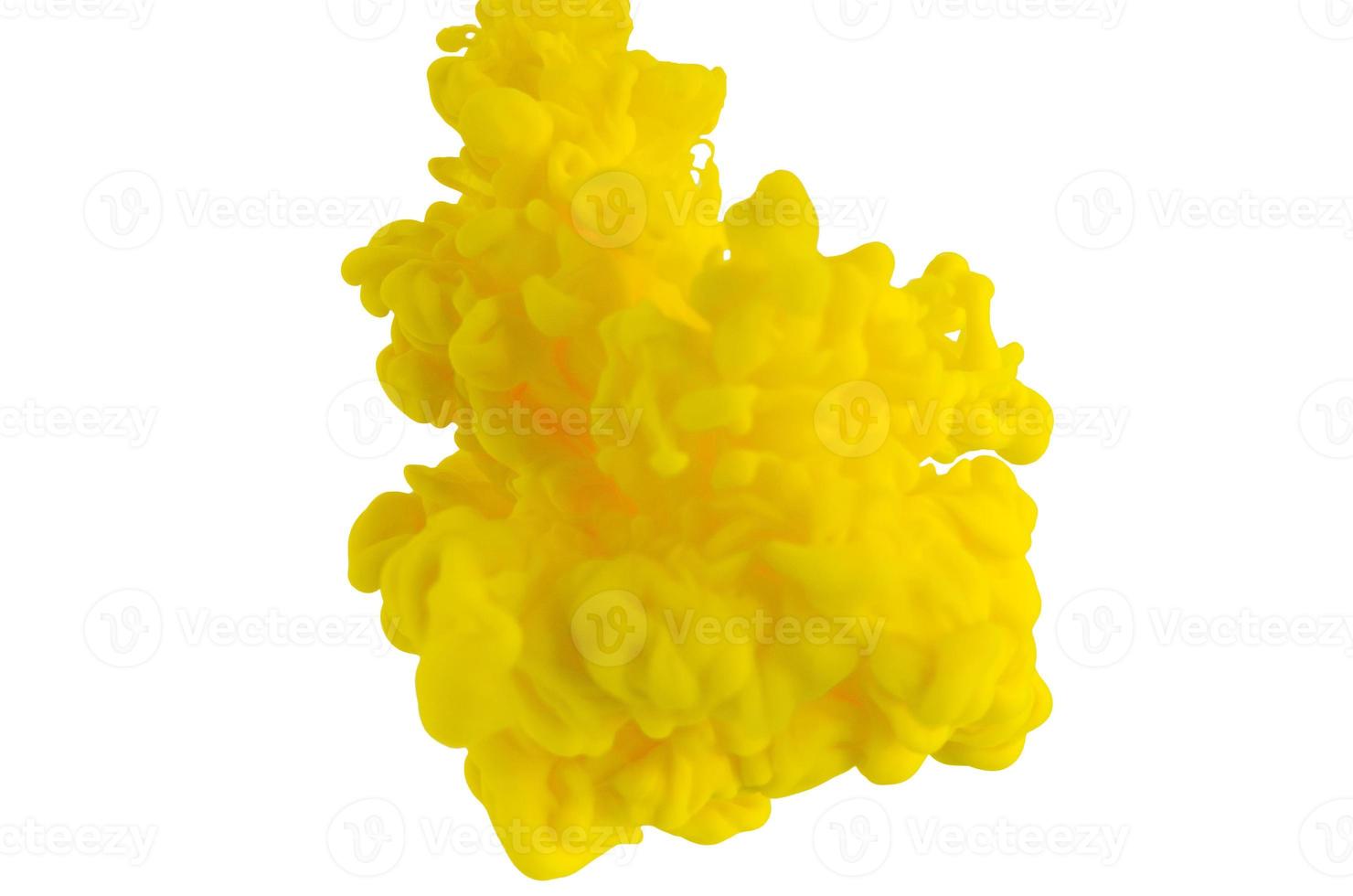 Blurred and focus yellow poster color dissolving in water for abstract and backgorund concept. photo