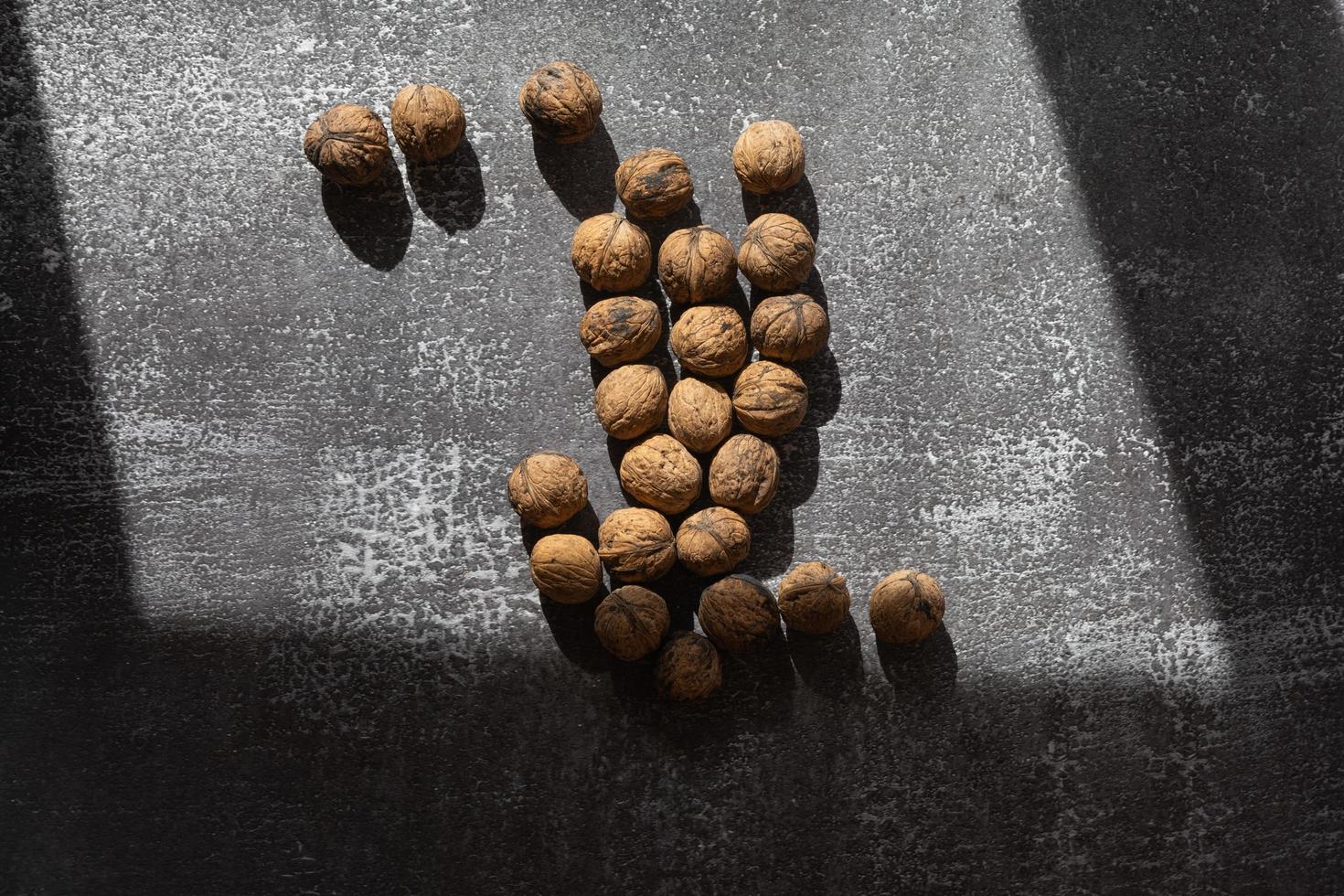 Walnuts on rustic background photo