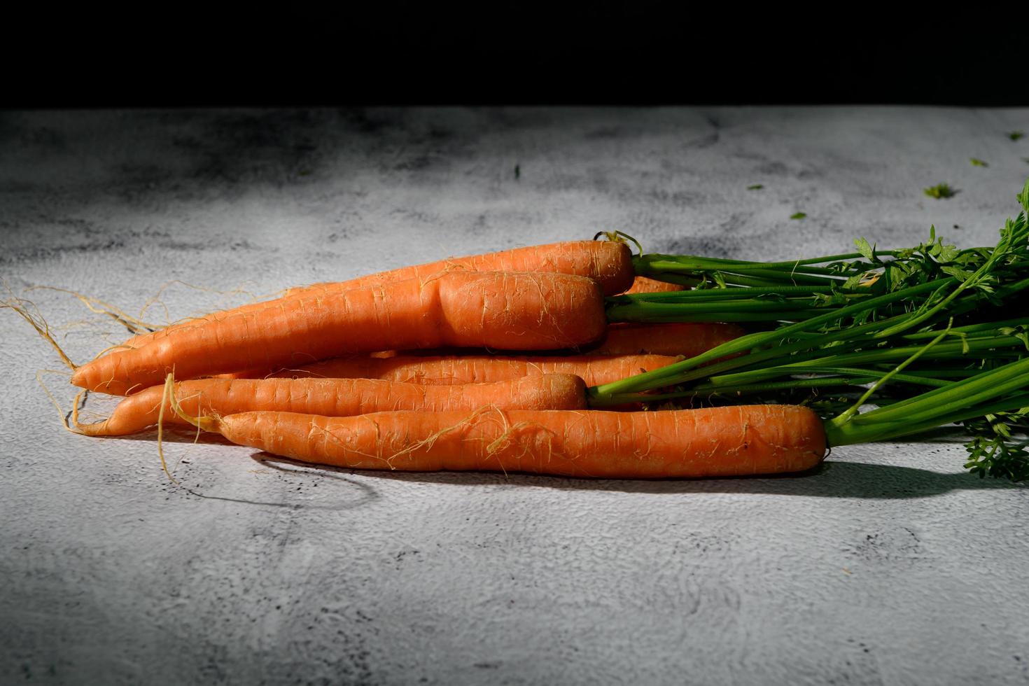 Carrots on a rustic table photo
