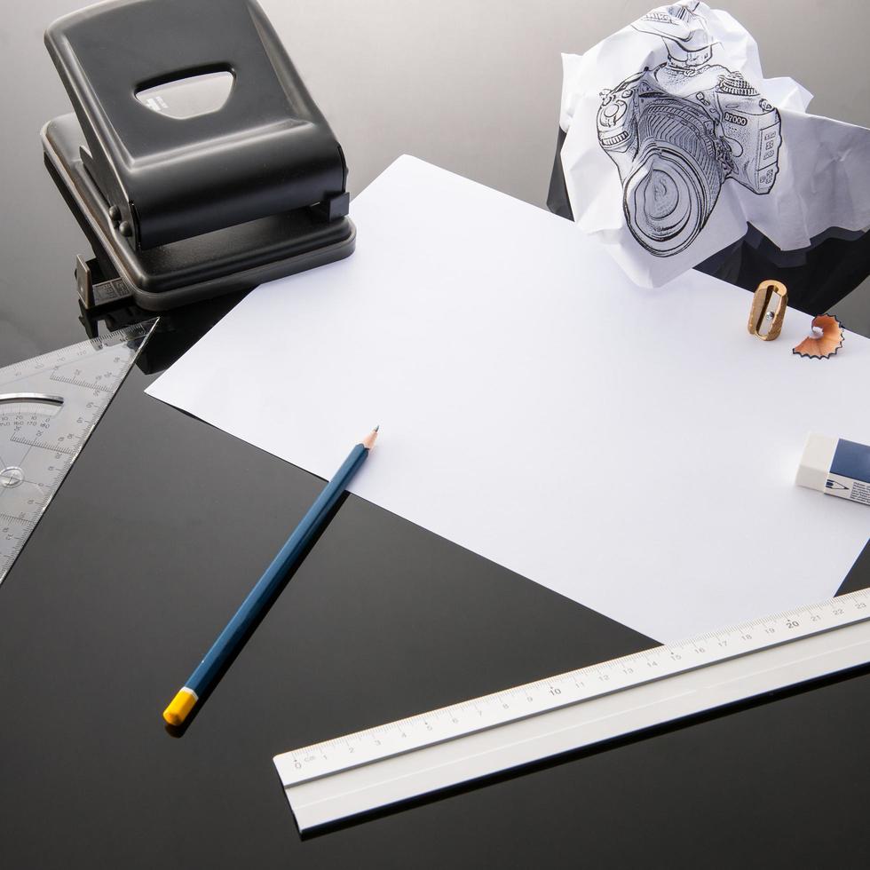 Office supplies on black table photo