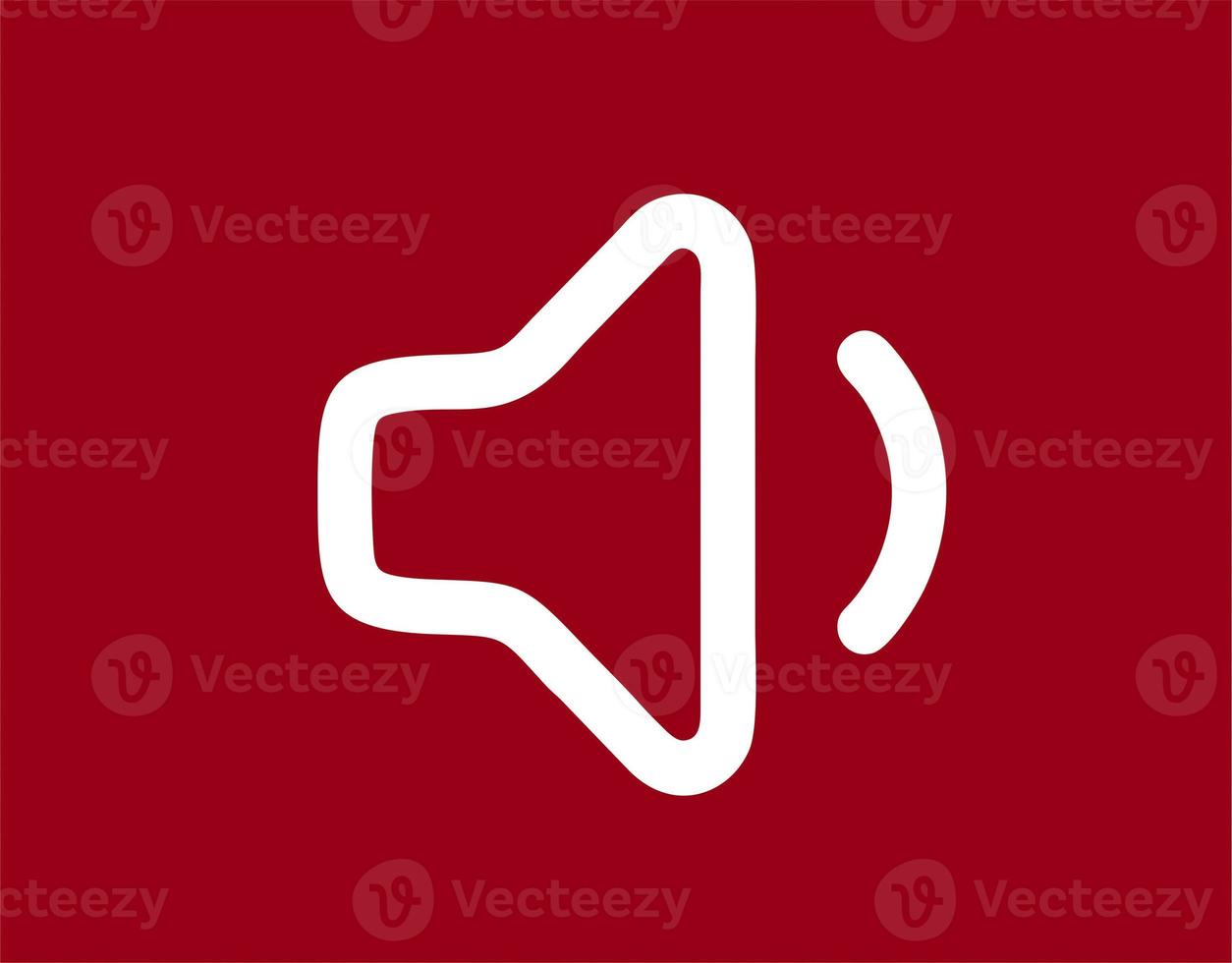 Illustration of a megaphone in white on a red background. simple megaphone design image. simple megaphone icon photo