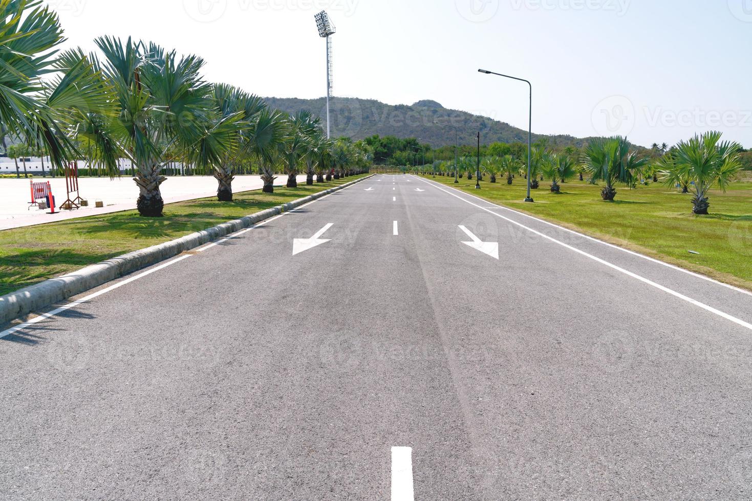 asphalt road with white arrow photo