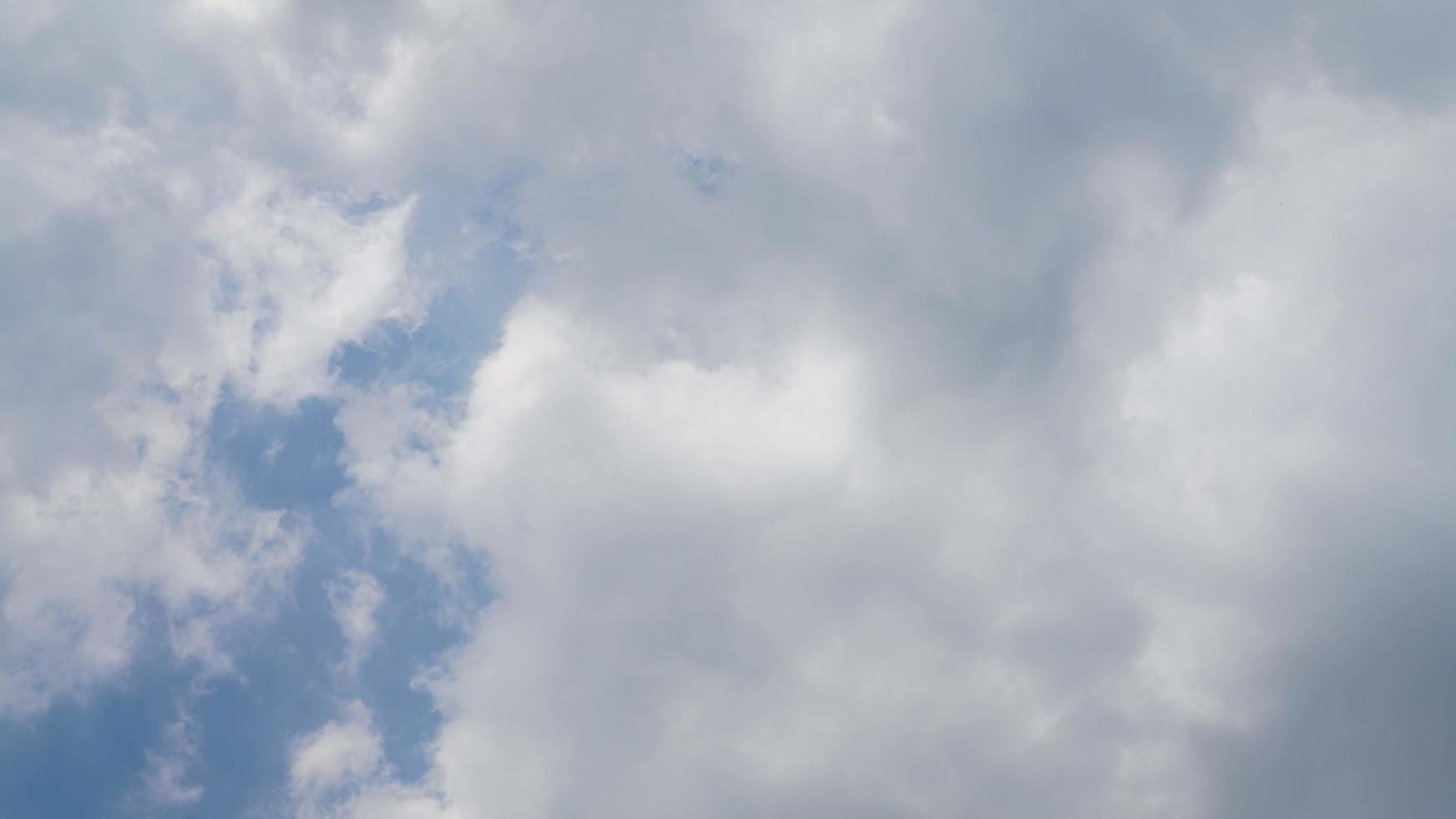 White cloud and blue sky background with copy space photo