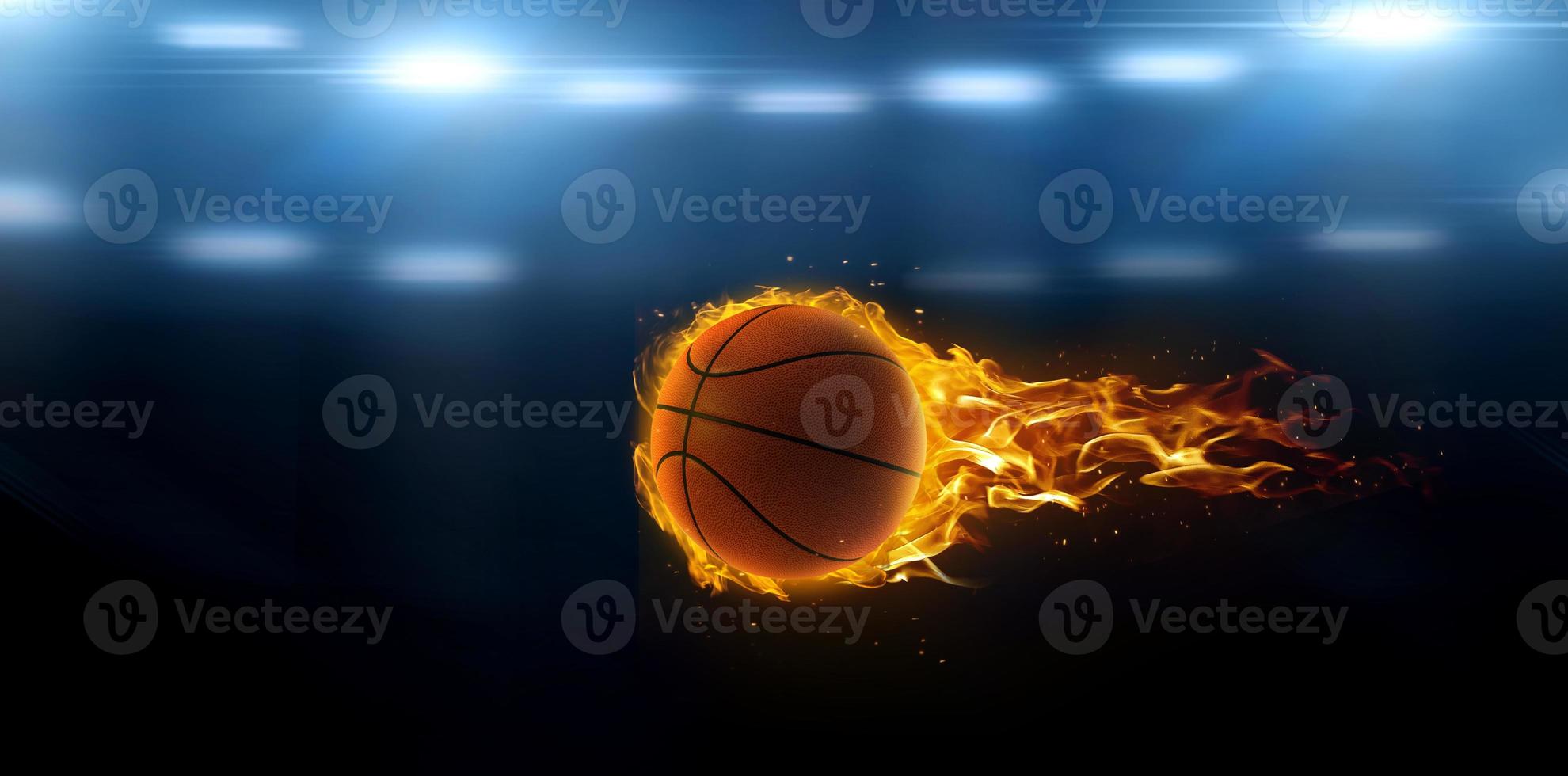 asketball on fire in basketball court stadium with lights in the field shining photo