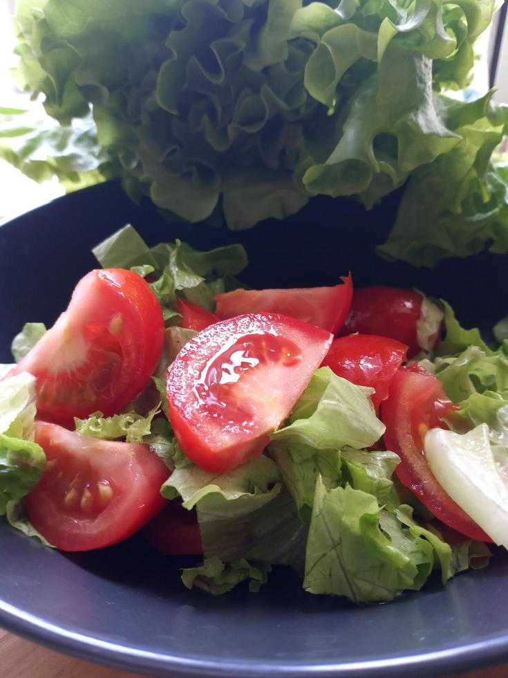 Plate with tomato salad. Healthy food, diet, cooking photo