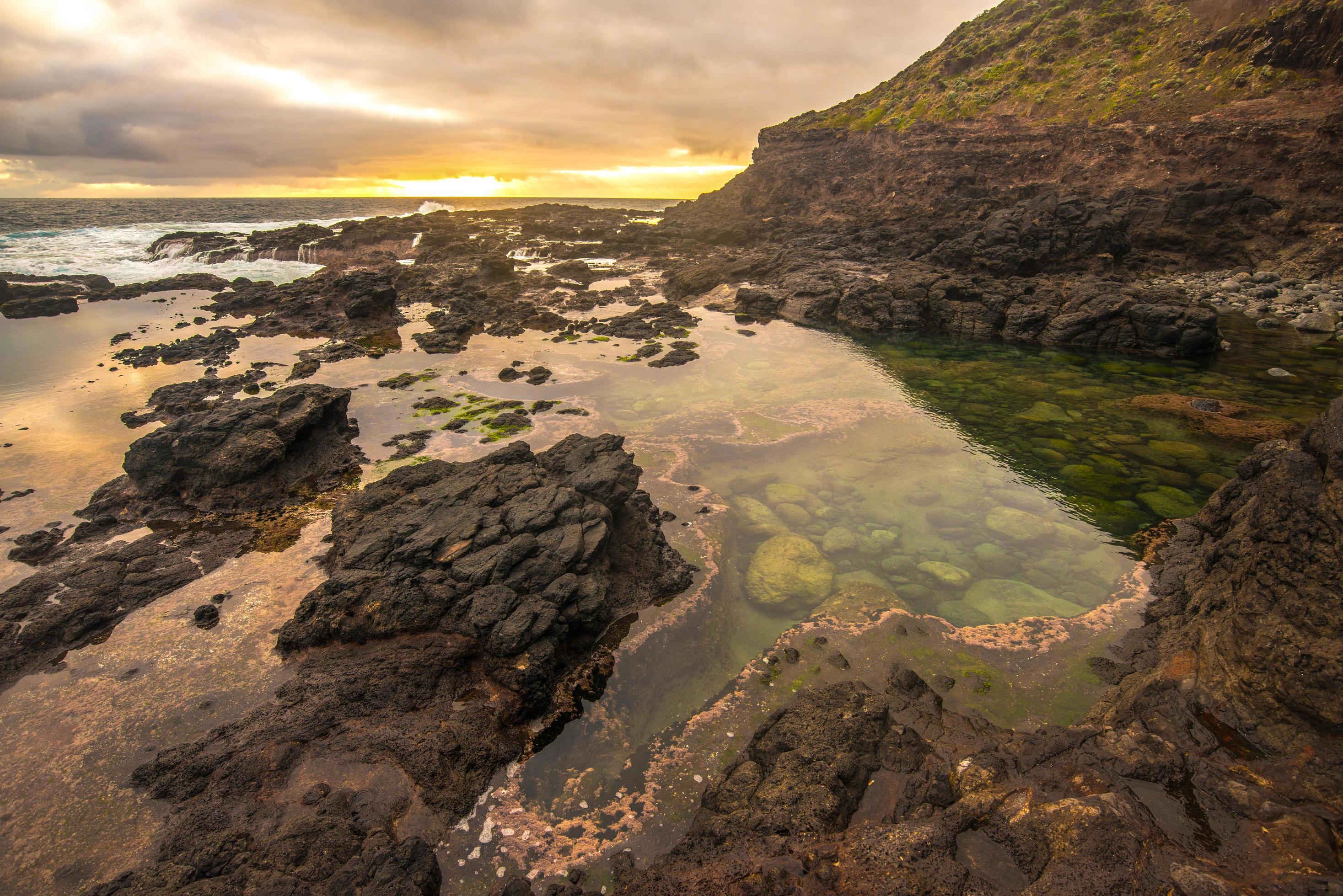 The rock pool in Cape Schanck of Mornington peninsula, Victoria state of Australia at sunset