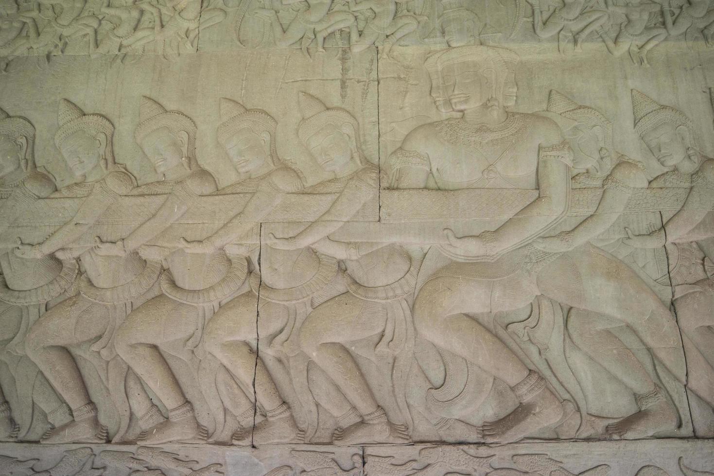 Ancient Khmer bas relief wall carving inside the inner wall of Angkor Wat, Cambodia. photo