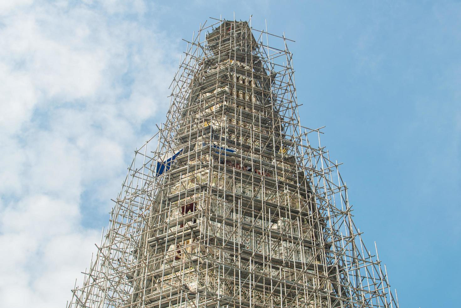 Wat Arun or temple of the dawn under repairing in Bangkok the capital cities of Thailand. photo