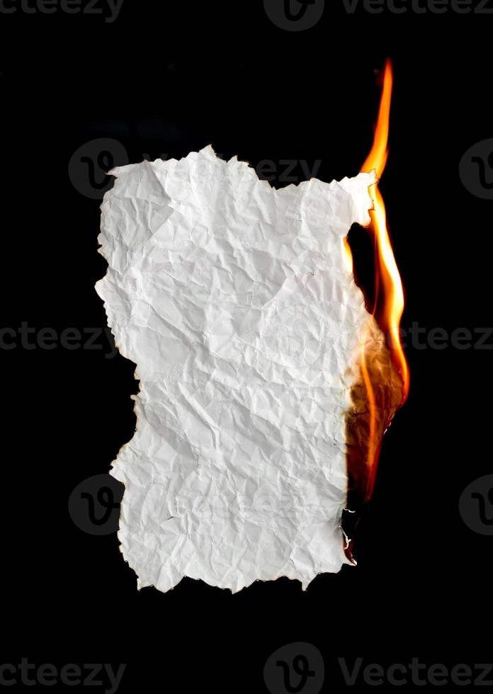 burning paper dark background photo