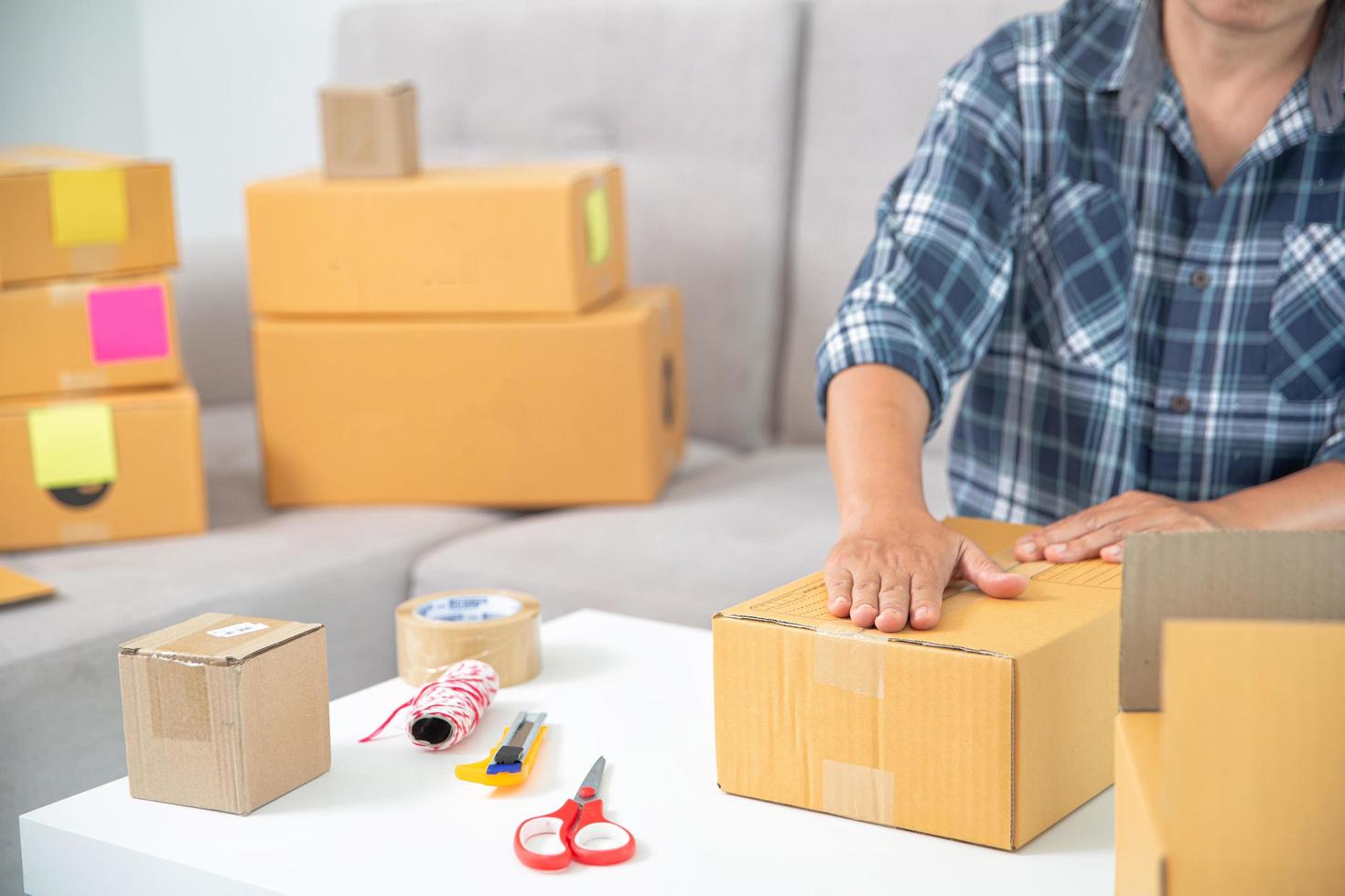 Women working freelance and packing box photo