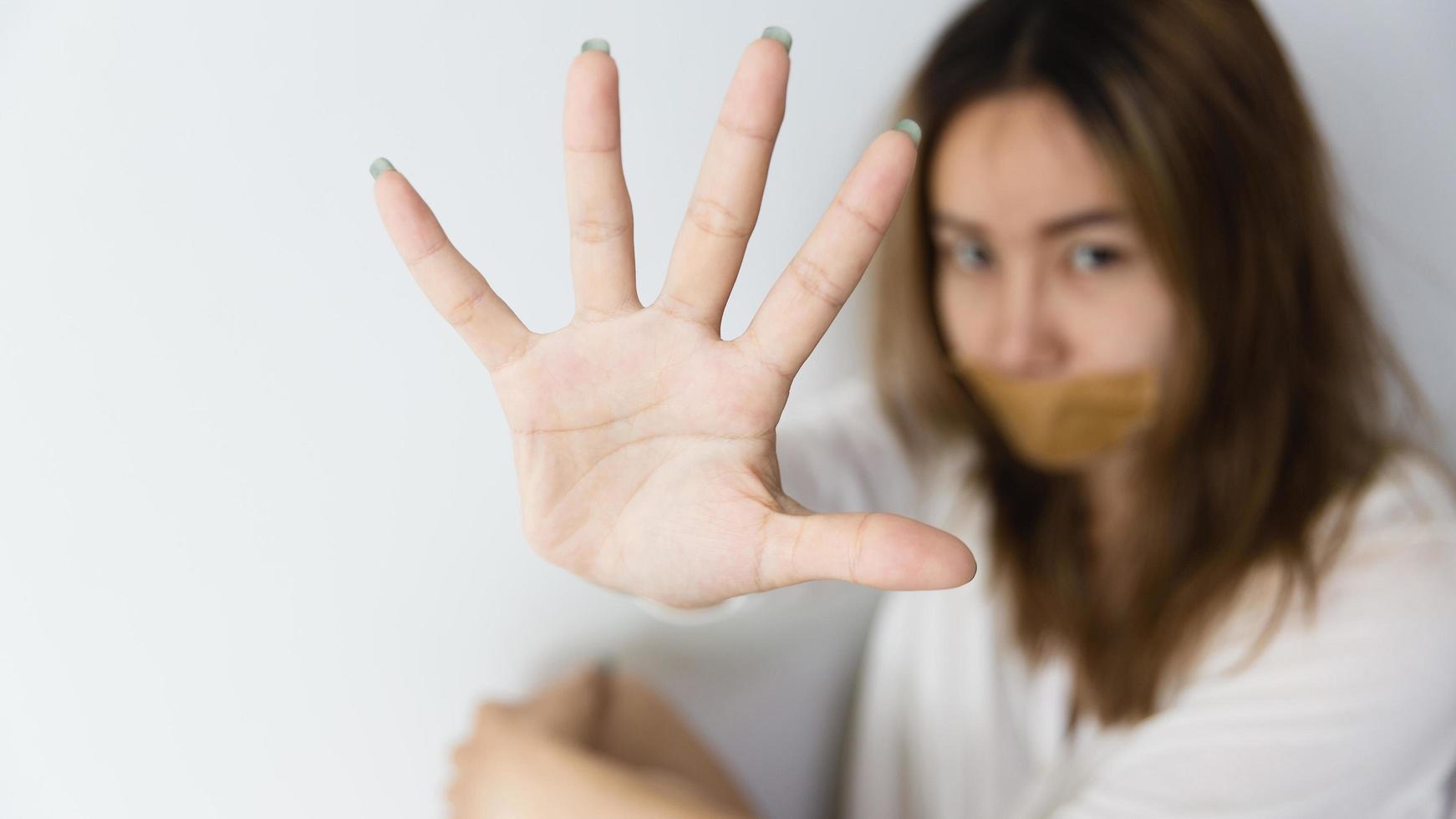 Women lift the palm,Stop violence and sexual abuse against women photo