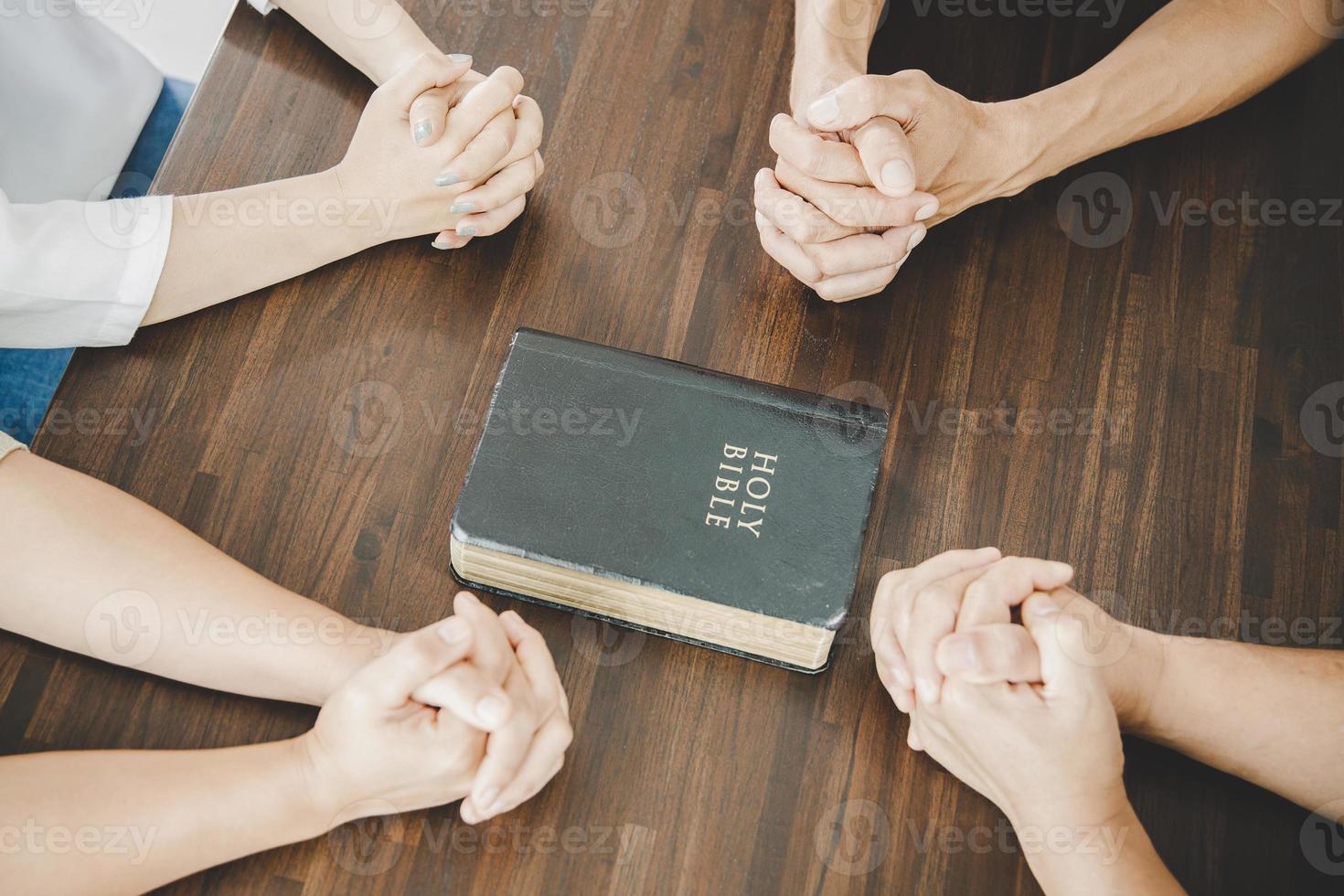 Group of people praying worship believe photo