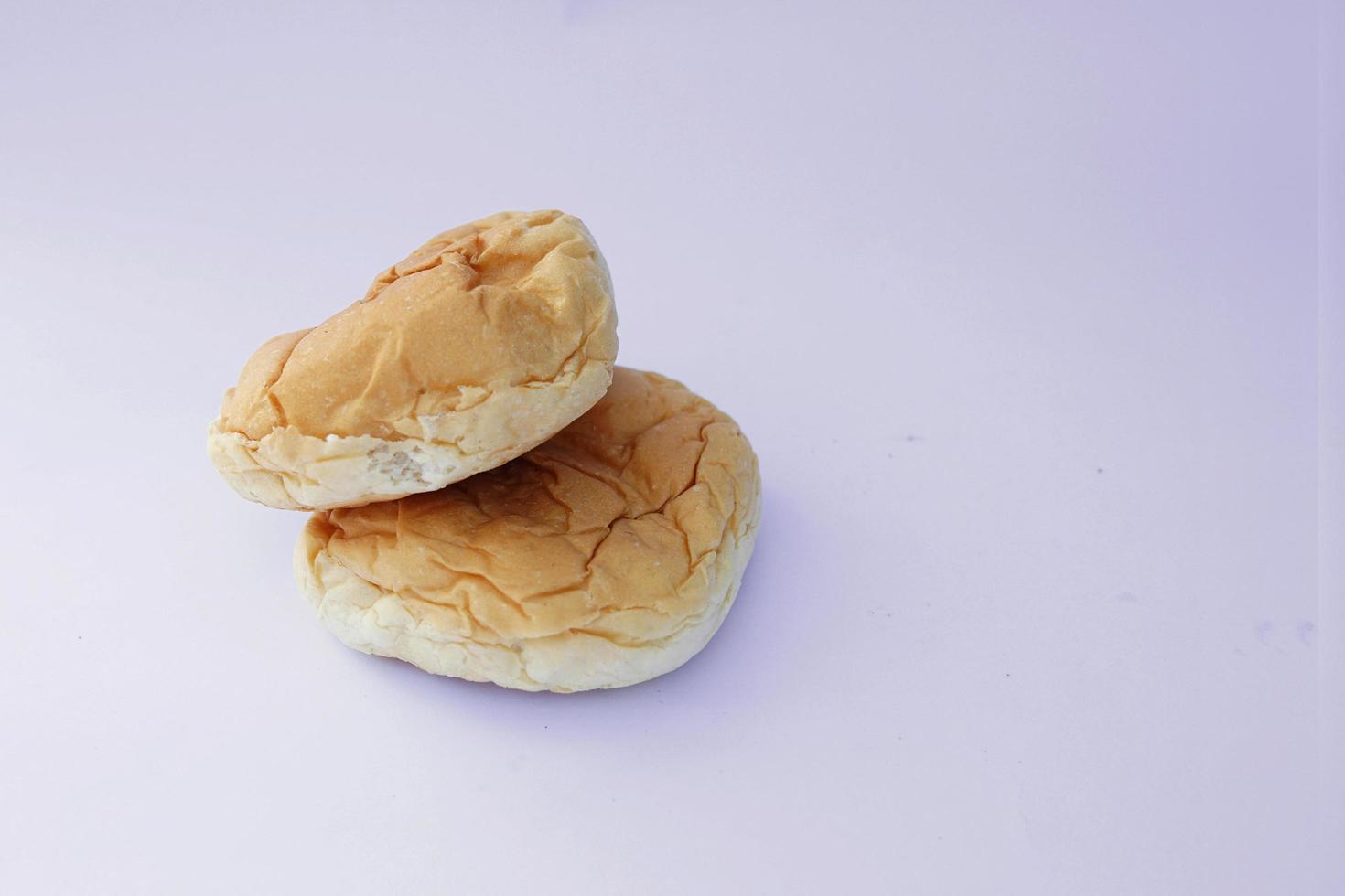 carbohydrate food, 2 stacked white bread on plain background photo