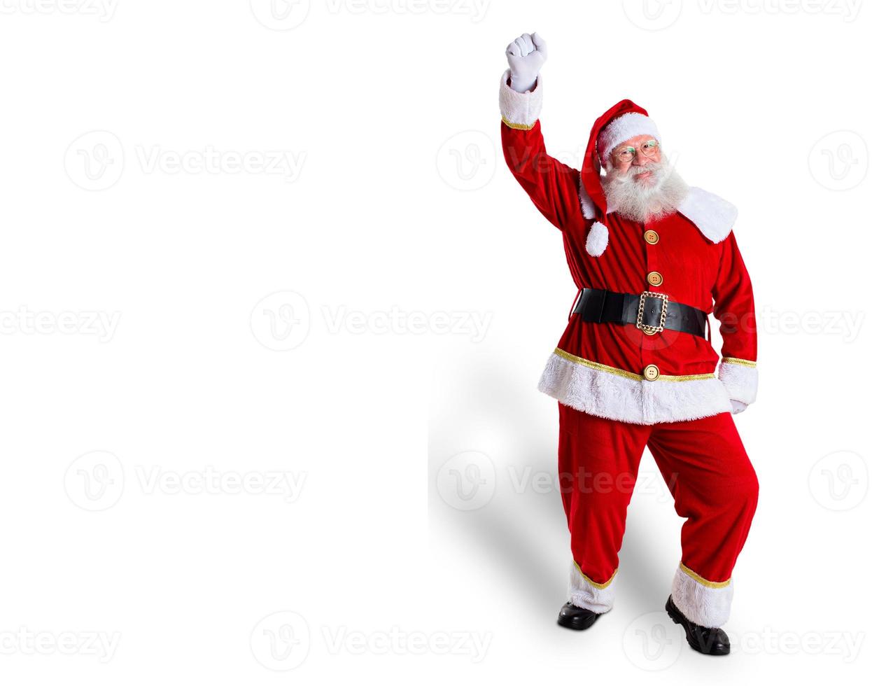 Santa Claus dancing on white background photo