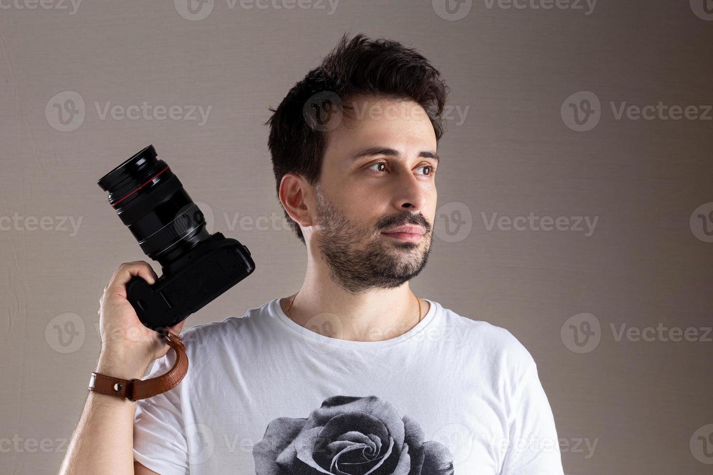 Man holding a camera photo